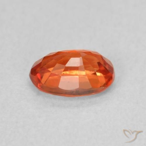 Saphir Orange chaud naturelle ovale, 0.73 ct, VS