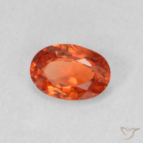 Saphir Orange rougeâtre naturelle ovale, 0.54 ct, VS