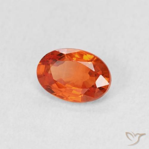 Saphir Orange rougeâtre naturelle ovale, 0.69 ct, VS