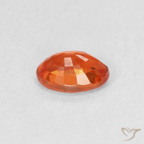 Saphir Orange rougeâtre naturelle ovale, 0.69 ct, VS