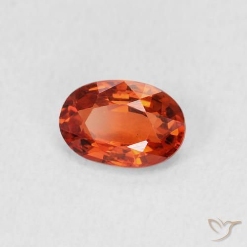 Saphir Orange rougeâtre naturelle ovale, 0.68 ct, VVS-VS