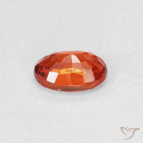Saphir Orange rougeâtre naturelle ovale, 0.68 ct, VVS-VS