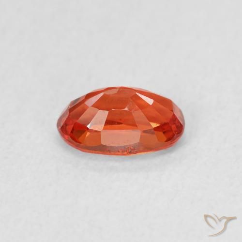 Saphir Orange rougeâtre naturelle ovale, 0.65 ct, VVS