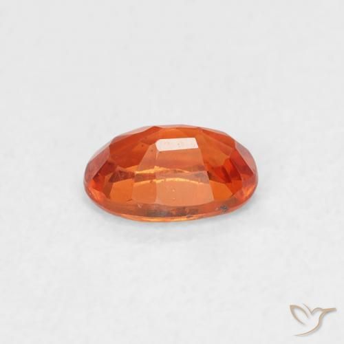 Saphir Orange rougeâtre naturelle ovale, 0.59 ct, VS