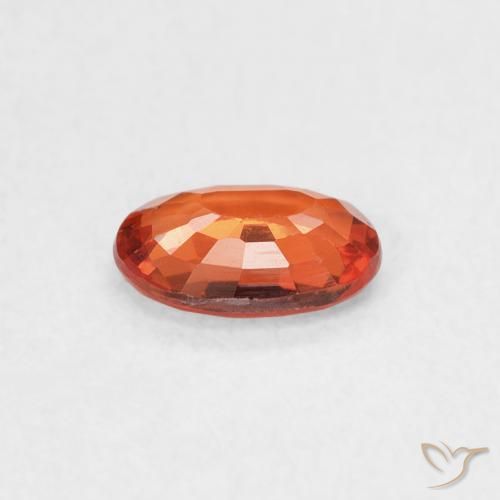 Saphir Orange rougeâtre naturelle ovale, 0.55 ct, VS