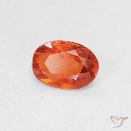 Saphir Orange rougeâtre naturelle ovale, 0.59 ct, VS