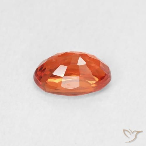 Saphir Orange rougeâtre naturelle ovale, 0.66 ct, VS