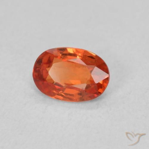 Saphir Orange rougeâtre naturelle ovale, 0.54 ct, VS