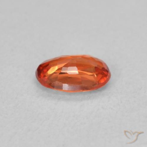 Saphir Orange rougeâtre naturelle ovale, 0.54 ct, VS