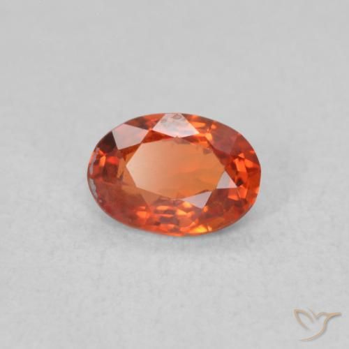 Saphir Orange rougeâtre naturelle ovale, 0.48 ct, VS
