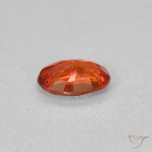 Saphir Orange rougeâtre naturelle ovale, 0.48 ct, VS