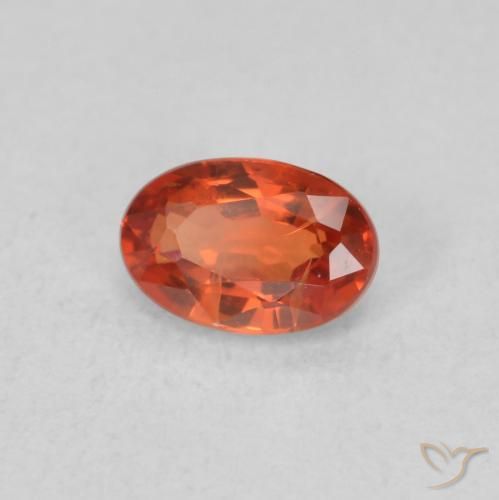 Saphir Orange rougeâtre naturelle ovale, 0.71 ct, VS
