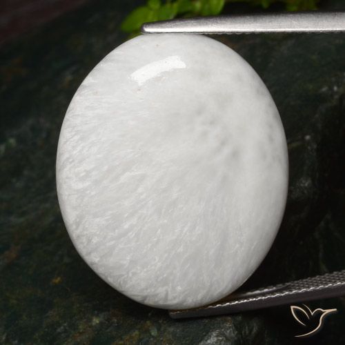 25.71ct Naturel Blanc léger Scolécite, ovale, Opaque