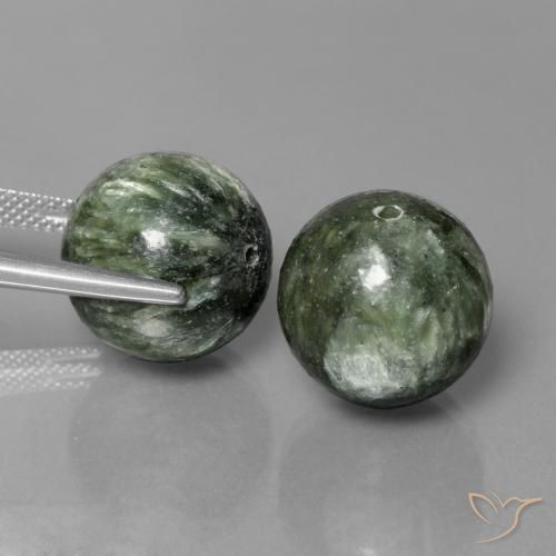 Shop natural 38.66ct Vert moyen Séraphinite gems, Sphère / Boule, from Russie at GemSelect. In stock, global shipping!