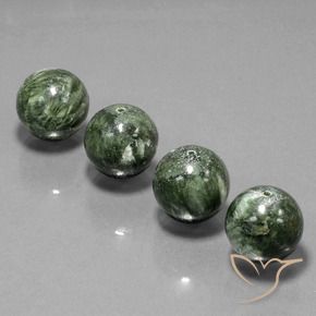 Shop natural 77.78ct Vert militaire Séraphinite gems, Sphère / Boule, from Russie at GemSelect. In stock, global shipping!