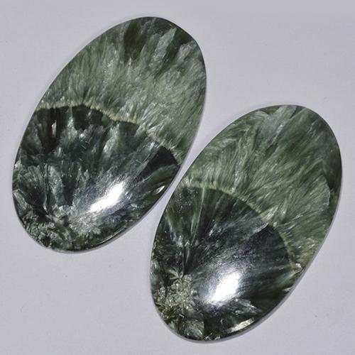 Achetez naturel 44.48ct Vert foncé Séraphinite gems, Coupe ovale, En provenance Russie chez GemSelect. En stock, livraison internationale!