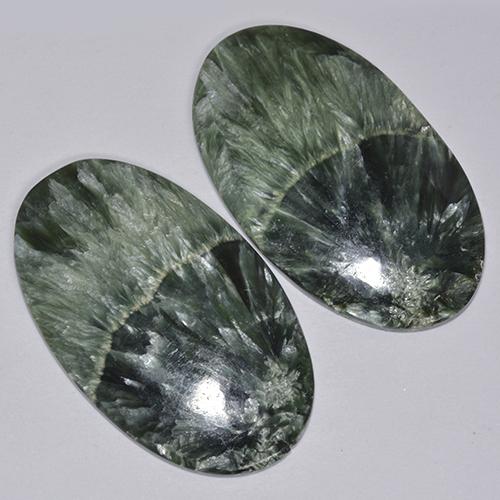 Achetez naturel 44.48ct Vert foncé Séraphinite gems, Coupe ovale, En provenance Russie chez GemSelect. En stock, livraison internationale!