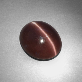Sillimanite œil de chat Brun violacé naturelle Coupe ovale, 3.43 ct, Opaque