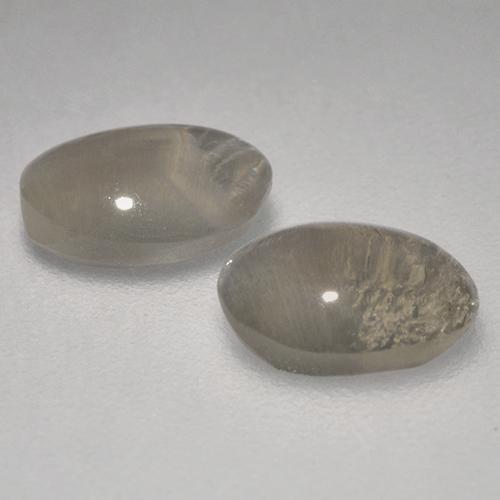 Shop natural 1.95ct Brun gris Sillimanite œil de chat gems, ovale, from Madagascar at GemSelect. In stock, global shipping!