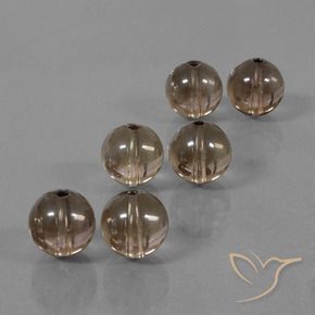 Shop natural 44.98ct Brun caryer Quartz fumé gems, Sphère / Boule, from Brésil at GemSelect. In stock, global shipping!