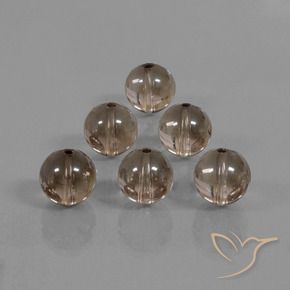 Shop natural 44.95ct Brun caryer Quartz fumé gems, Sphère / Boule, from Brésil at GemSelect. In stock, global shipping!