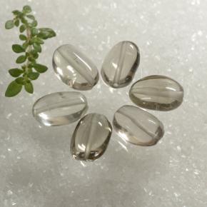 Shop natural 8.86ct Bois marron très clair Quartz fumé gems, ovale, from Brésil at GemSelect. In stock, global shipping!