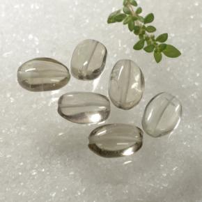 Shop natural 8.86ct Bois marron très clair Quartz fumé gems, ovale, from Brésil at GemSelect. In stock, global shipping!