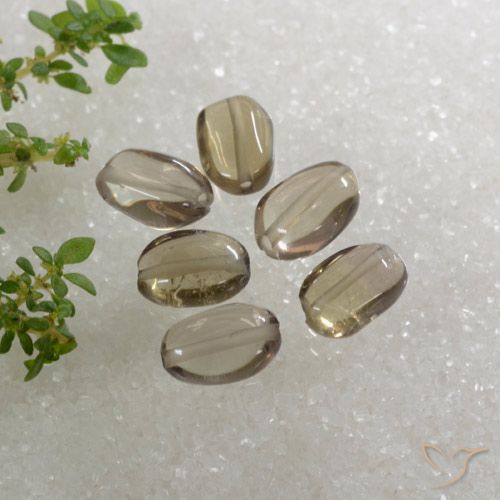 Achetez naturel 6.14ct Bois marron très clair Quartz fumé gems, Coupe ovale, En provenance Brésil chez GemSelect. En stock, livraison internationale!