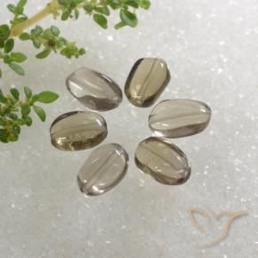 Achetez naturel 6.14ct Bois marron très clair Quartz fumé gems, Coupe ovale, En provenance Brésil chez GemSelect. En stock, livraison internationale!
