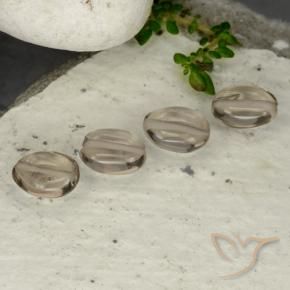 Shop natural 4.62ct Brun ambré léger Quartz fumé gems, ovale, from Brésil at GemSelect. In stock, global shipping!