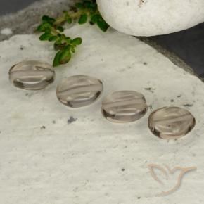 Shop natural 4.62ct Brun ambré léger Quartz fumé gems, ovale, from Brésil at GemSelect. In stock, global shipping!