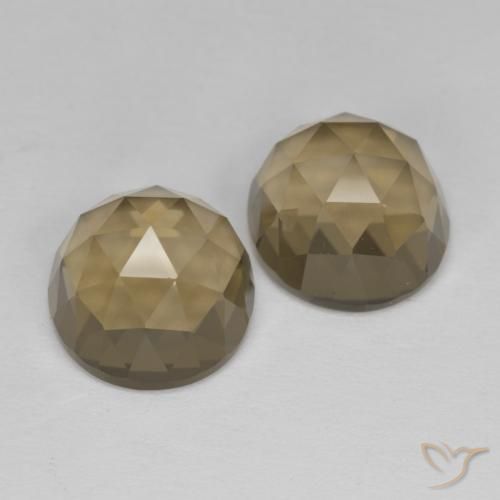 Shop natural 9.43ct Brun moyen-léger Quartz fumé gems, ovale, from Brésil at GemSelect. In stock, global shipping!