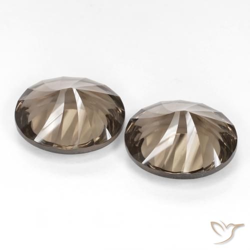 Shop natural 13.67ct Brun moyen-léger Quartz fumé gems, ovale, from Brésil at GemSelect. In stock, global shipping!