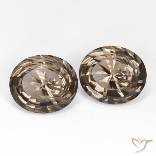 Shop natural 13.90ct Brun ambré léger Quartz fumé gems, ovale, from Brésil at GemSelect. In stock, global shipping!