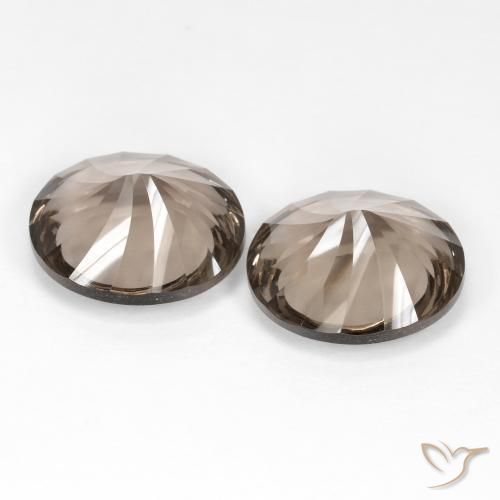 Shop natural 13.90ct Brun ambré léger Quartz fumé gems, ovale, from Brésil at GemSelect. In stock, global shipping!