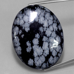 Obsidienne flocon de neige noir naturelle coupe ovale, 48,46 ct, opaque