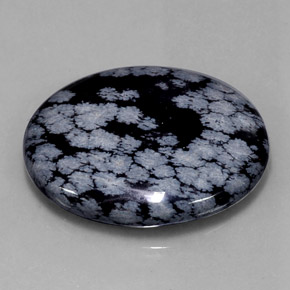 Obsidienne flocon de neige noir naturelle coupe ovale, 48,46 ct, opaque