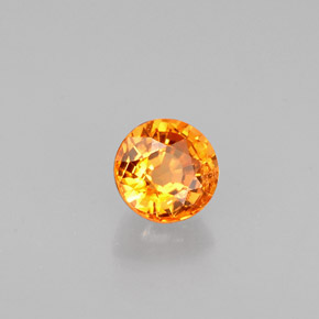 Grenat spessartite orange naturelle coupe roude, 0,68 ct, VS