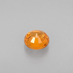 Grenat spessartite mandarine orange naturelle coupe roude, 0,70 ct, VVS