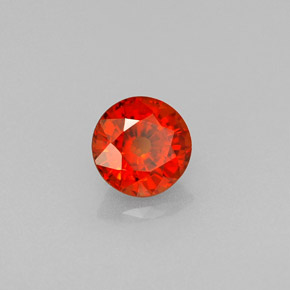 Grenat spessartite orange naturelle coupe roude, 0,64 ct, VS