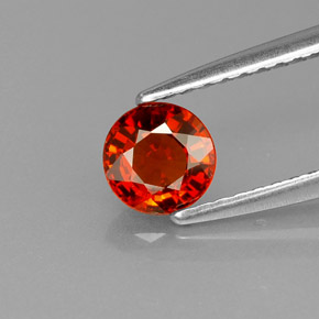 Grenat spessartite orange naturelle coupe roude, 0,65 ct, VVS-VS