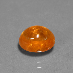 Grenat spessartite orange naturelle coupe ovale, 3,69 ct, translucide