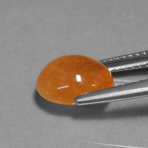 Grenat spessartite orange naturelle coupe ovale, 3,94 ct, translucide