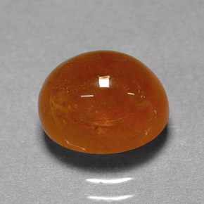 Grenat spessartite orange naturelle coupe ovale, 4,46 ct, translucide