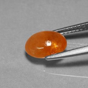 Grenat spessartite orange naturelle coupe ovale, 3,15 ct, translucide