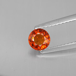 Grenat spessartite orange naturelle coupe roude, 0,64 ct, VS