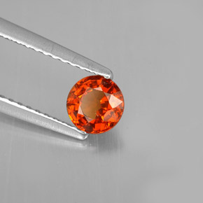 Grenat spessartite orange naturelle coupe roude, 0,64 ct, VS
