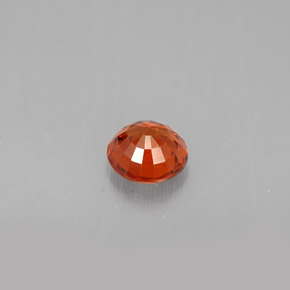 Grenat spessartite orange naturelle coupe roude, 0,64 ct, VS