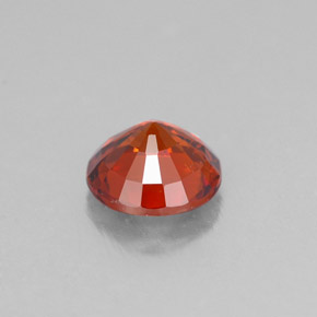 Grenat spessartite orange naturelle coupe roude, 0,69 ct, VVS-VS