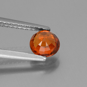 Grenat spessartite orange naturelle coupe roude, 0,87 ct, VVS-VS